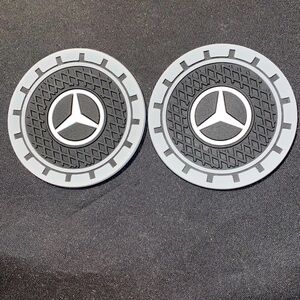 Mercedes Benz 2 Cup Holders w/Logo. Black & White colors